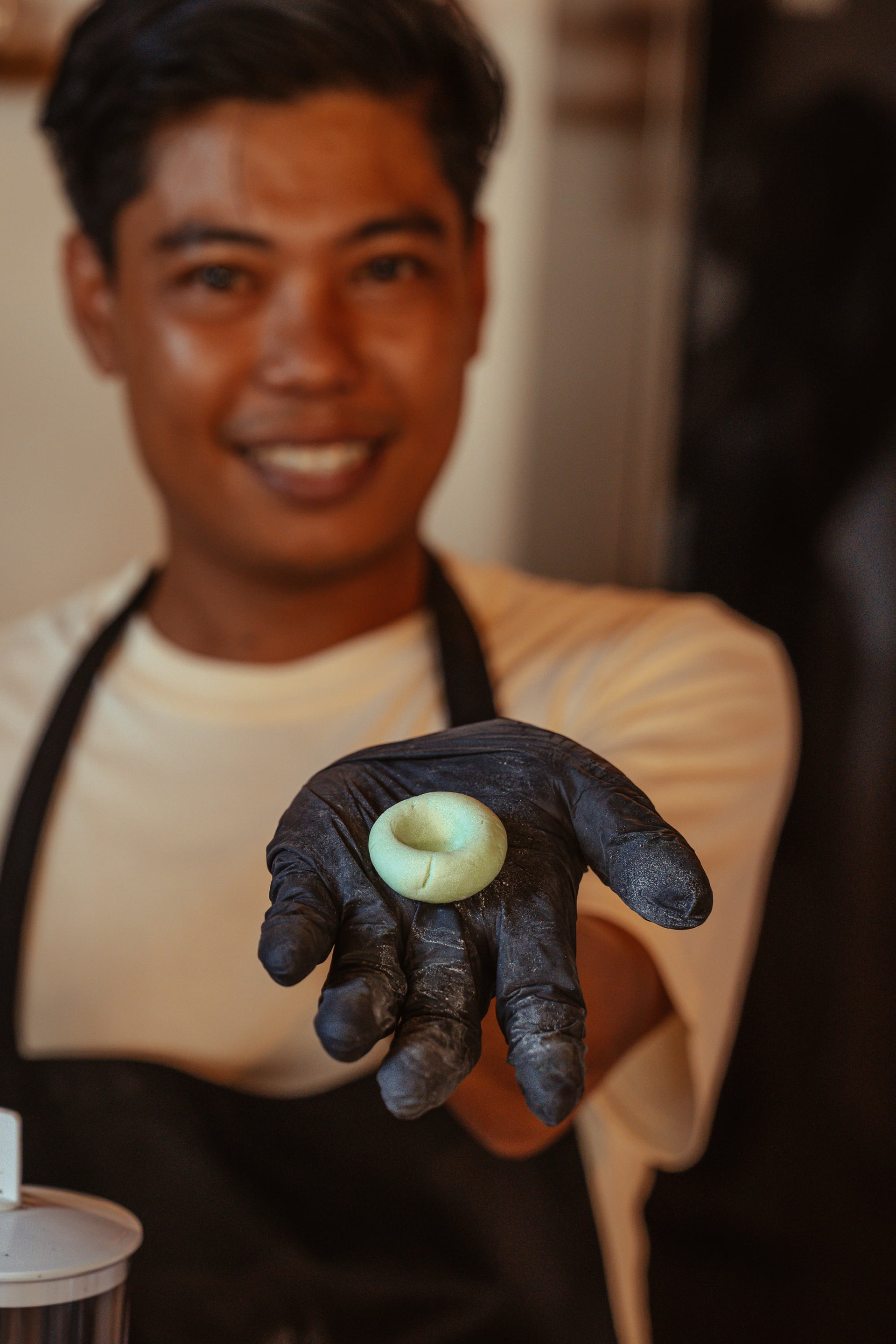 Guests preparing Indonesian dishes during the Divine Flavours Experience cooking class at Cooking on Meno, Gili Meno